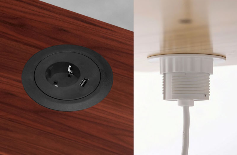 Vistas superior e inferior de un pasacables en un escritorio laminado de nogal con una sola toma de corriente y un conector USB.